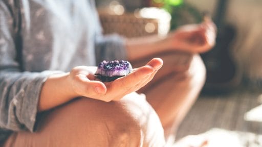 Ways To Use Purple Crystals - Hold the Stones While Meditating