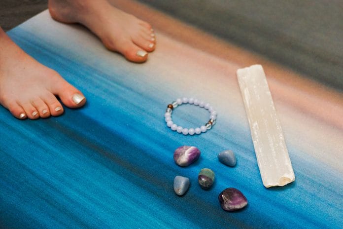 Place Crystals Around Your Yoga Mat